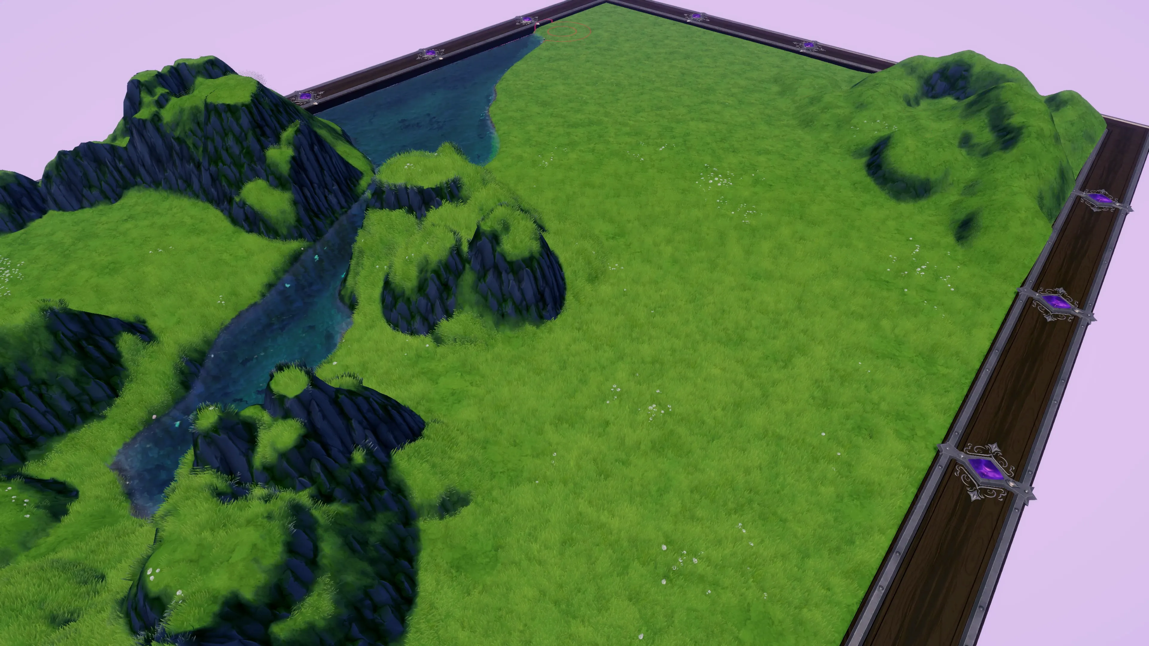 Mapmage grassland terrain board with cliffs, water, and raised hills.